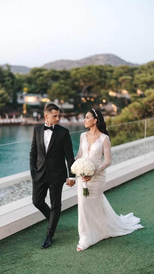 Golden hour magic and sea view elegance with Eleni & Ari. Could this be the most photogenic couple with the most iconic backdrop in Athens?

Save this as inspiration if a golden-hour wedding in Greece is on your vision board!

Wedding Planner @styleconcept.gr
Venue @fsathens
Photography @wedtime_stories 

#goldenhourweddingGreece #AthensRivierawedding #Greecewedding